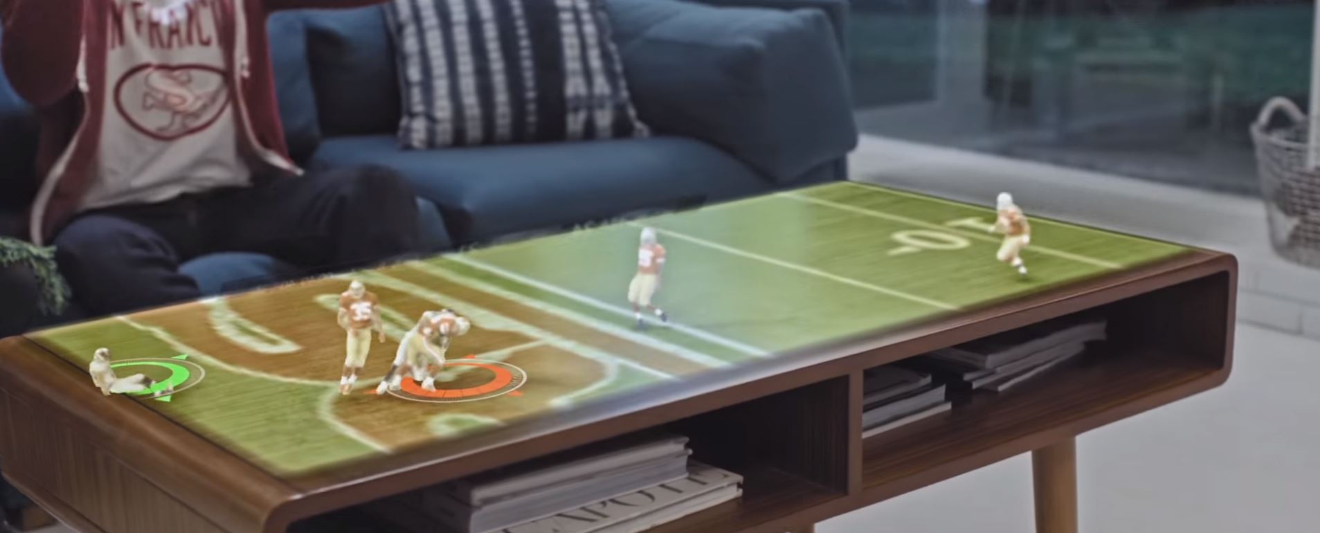 Microsoft HoloLens demo of an NFL game rendered live on a coffee table